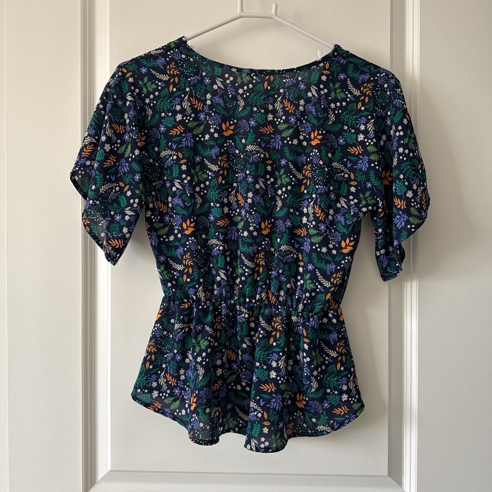 Sienna Sky Navy Floral Peplum Blouse with Green & Orange Accents - Picture 5 of 7